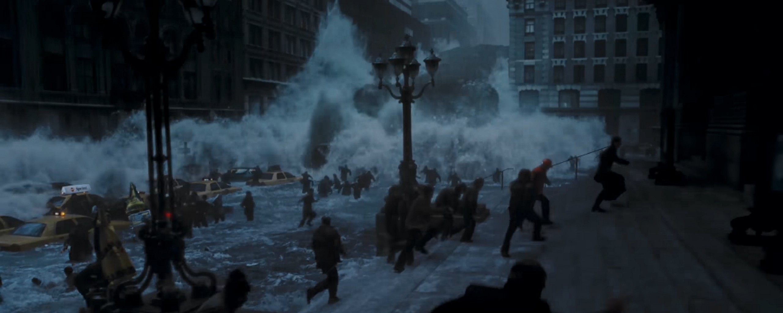 A scene from the movie "Day After Tomorrow" with people fleeing a tidal wave that has entered Manhattan and is flooding the streets.